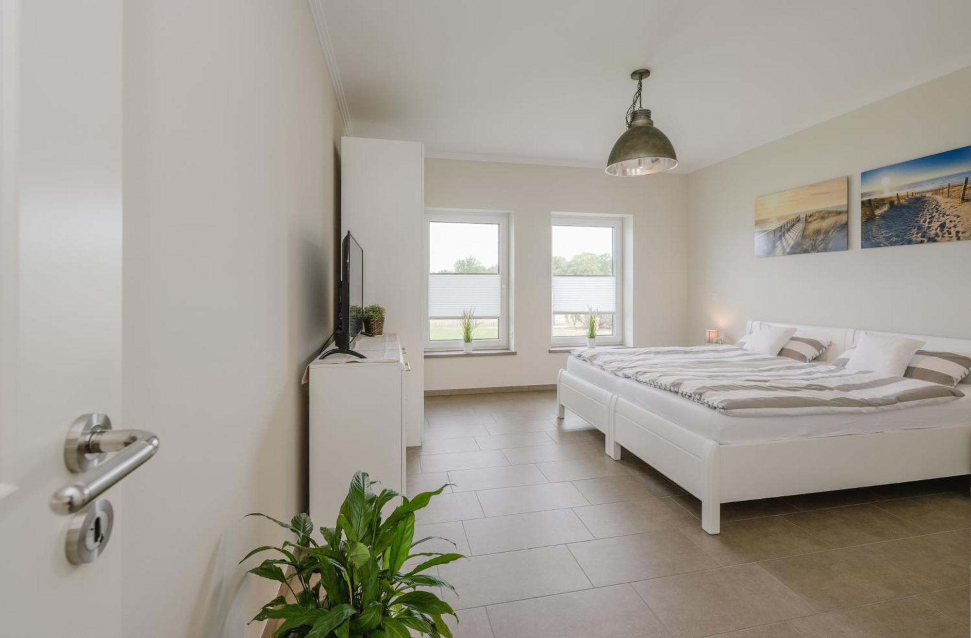 Ferienhaus Seeblick Walchum Bagian luar foto